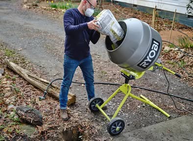 Cement mixer pouring concrete